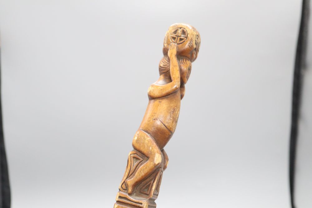 A carved fertility stick, c.1840, length 79cm